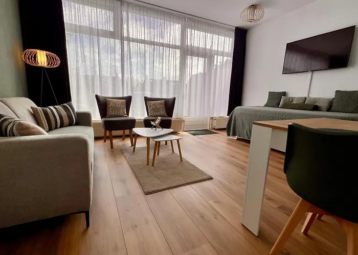 Апартаменты Reumann De Schelp 12 Зандфорт